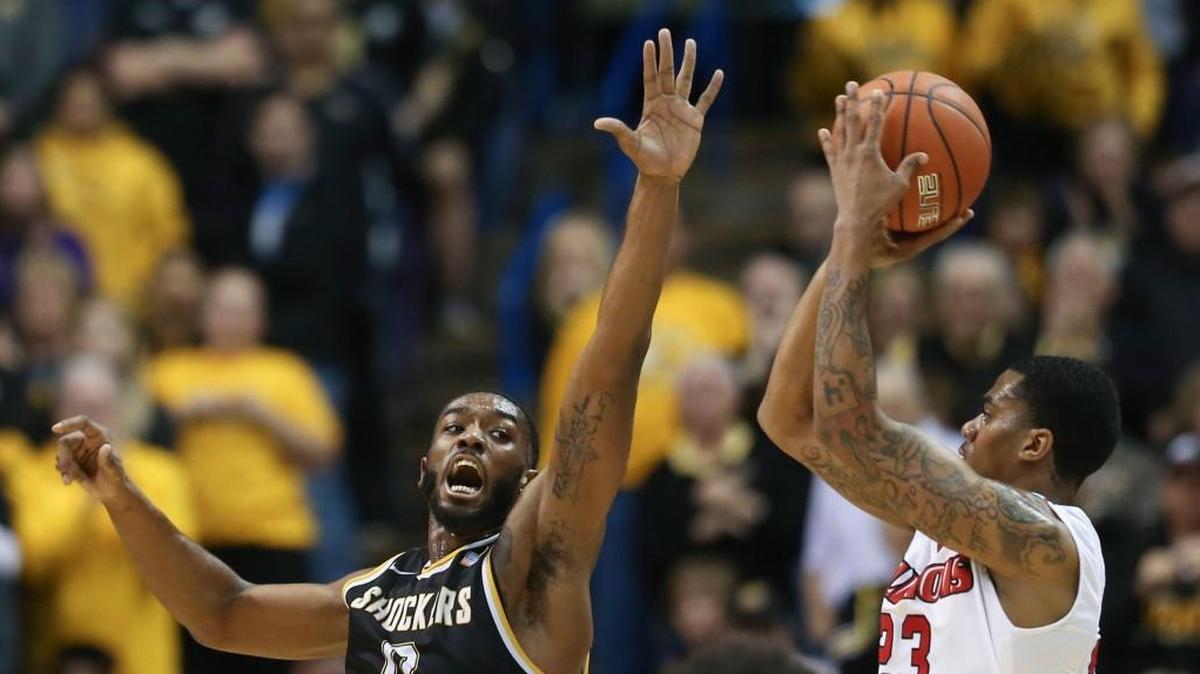 Wichita State forward Rashard Kelly defends Illinois State forward Deontae Hawkins during the first half the Missouri Valley Conference Tournament championship game last season.