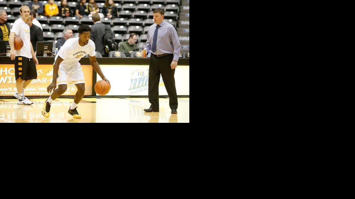 
Wichita State assistant Greg Heiar works with Zach Brown, center, and Conner Frankamp, far left, before a January game. Heiar has been refining skills with Shockers this week in preparation for the NCAA Tournament.
