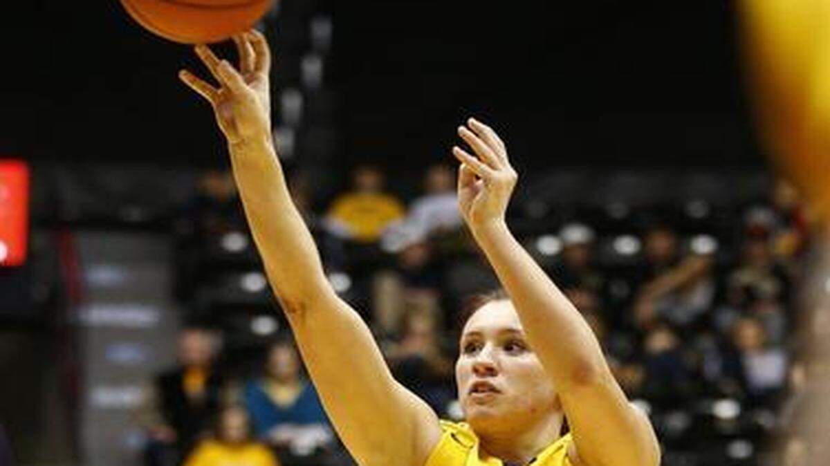 
Wichita State's Michaela Dapprich puts up a three-point shot in the first half against Illinois State on Friday night at Koch Arena. Dapprich was the game’s high scorer with 18 points.
