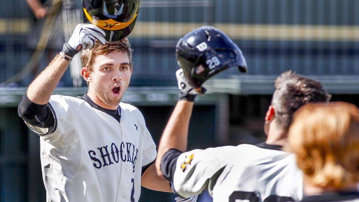 
Wichita State’s Ryan Tinkham celebrates after homering in the seventh inning against New Mexico to give the Shockers a 5-4 lead Saturday at Eck Stadium. 

