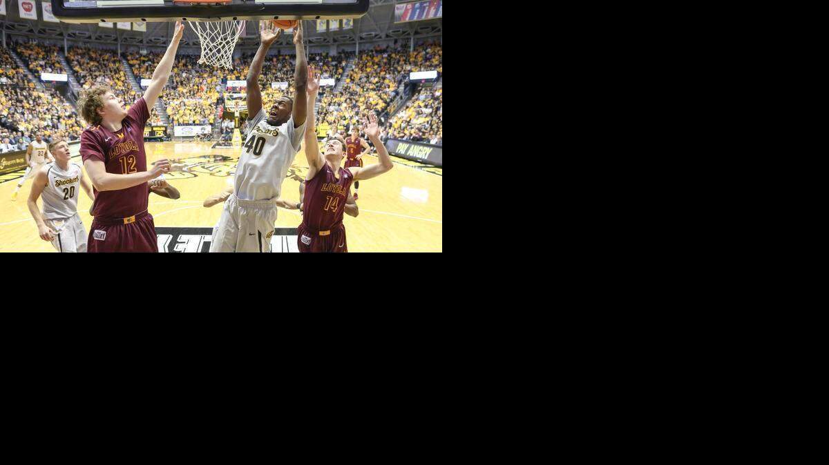 
Wichita State forward Tevin Glass fights for a rebound against Loyola forward Julius Rajala, left, and guard Ben Richardson during the second half on Jan. 28 at Koch Arena.
