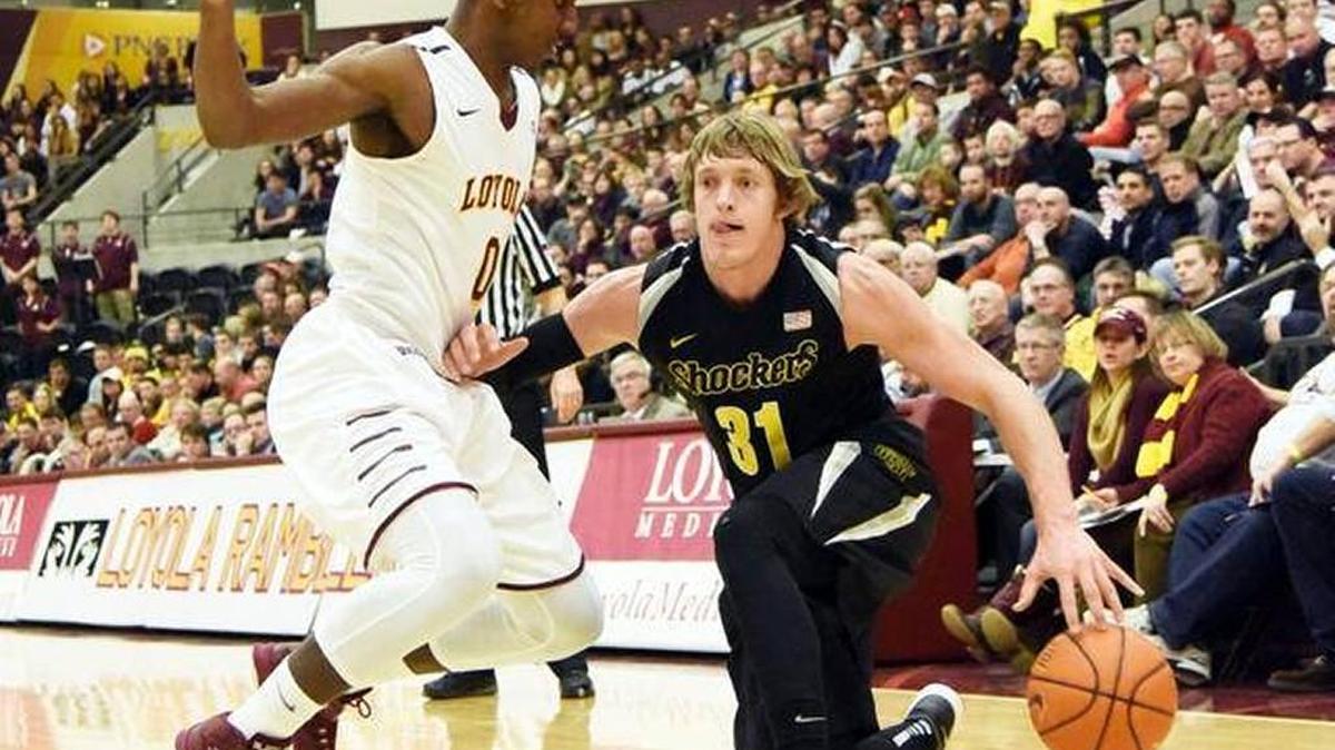 Loyola’s Donte Ingram guards Wichita State’s Ron Baker at Gentile Arena in Chicago.