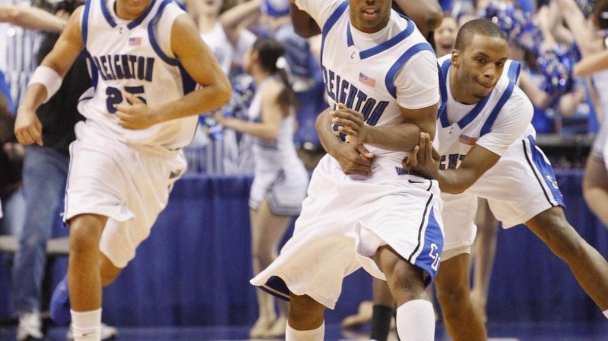 Creighton's Booker Woodfox, center, celebrates with Cavel Witter, right, and Kenny Lawson, right, after hitting a last second shot to beat WSU 63-62 in a 2009 MVC quarterfinal game.