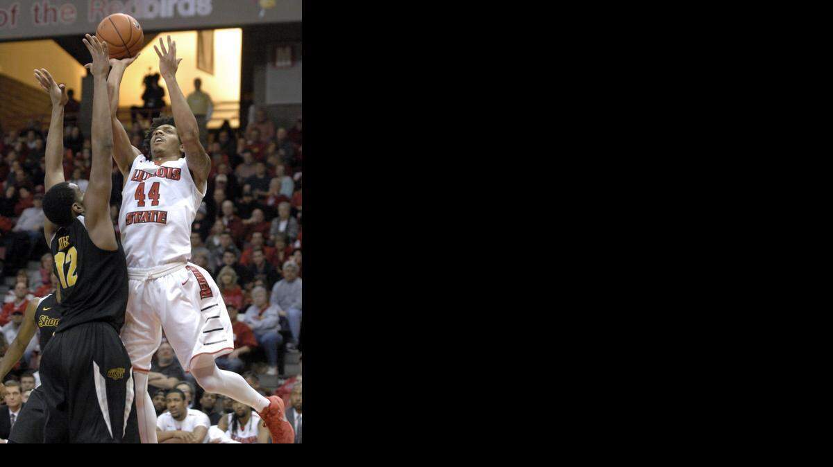 
Illinois State's DeVaughn Akoon-Purcell goes up for a shot over Wichita State's Darius Carter during an NCAA college basketball game at Redbird Arena in Normal, Ill. on Saturday, Feb. 14, 2015. (AP Photo/The Pantagraph, Carlos T. Miranda) 

