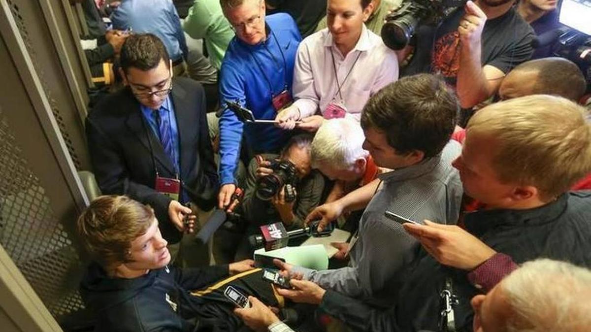 
Wichita State senior guard Ron Baker and a media horde.
