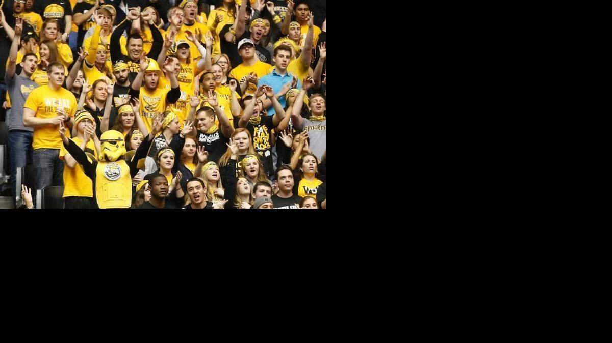 
Wichita State fans cheer during Sunday’s 74-40 victory over Drake at Koch Arena. WSU’s 34-point margin of victory is its largest in the series.
