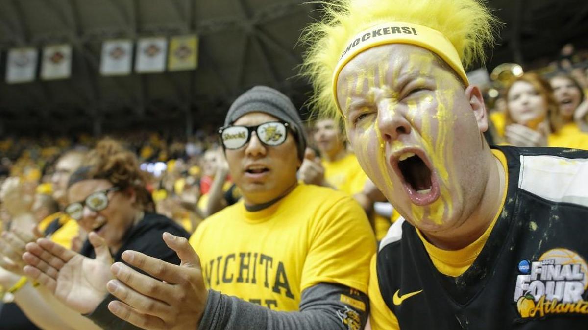 Wichita State fans cheer as the Shockers take the floor before their game against Evansville at Koch Arena in 2014.