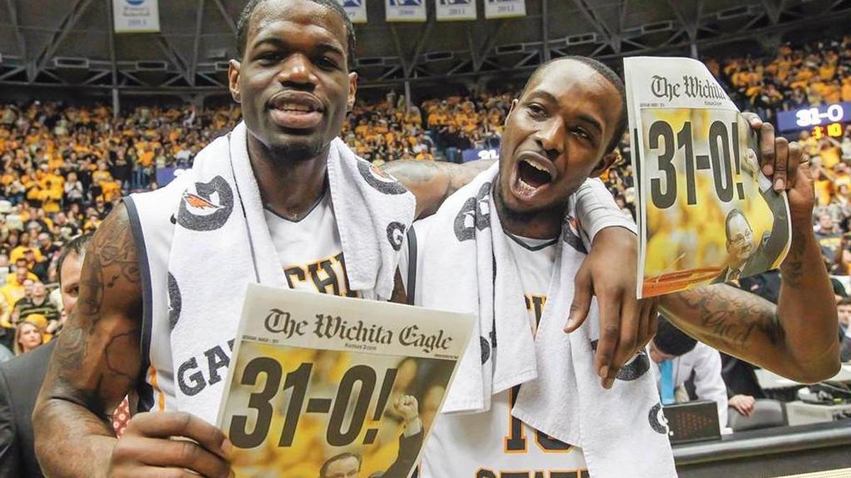 Wichita State’s Chadrack Lufile and Nick Wiggins celebrate a 31-0 record at Koch Arena.