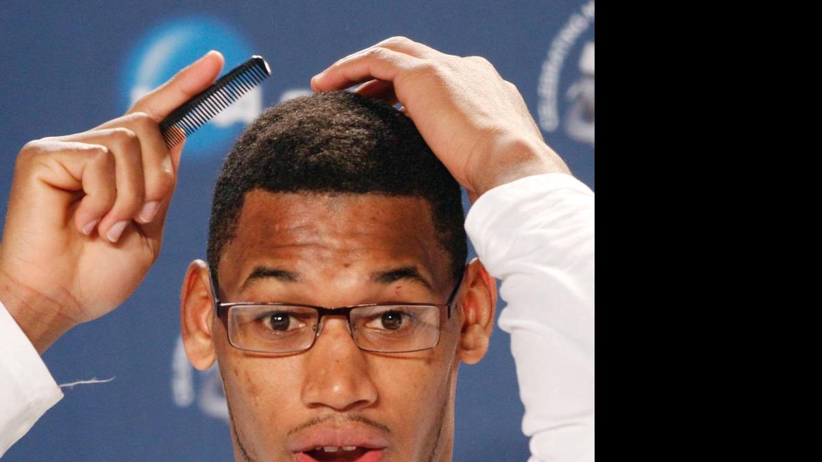 
Former Wichita State center Carl Hall helped the Shockers to the 2013 Final Four, shaving his dreadlocks along the way.
