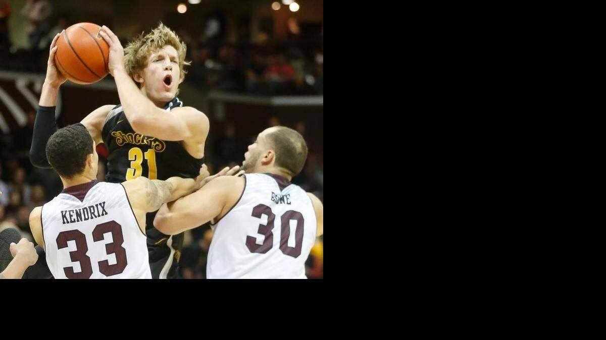 
Wichita State’s Ron Baker rebounds against Missouri State on Wednesday at JQH Arena.
