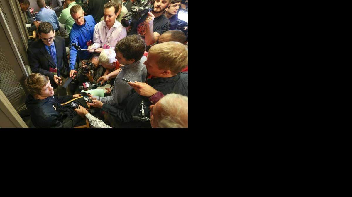 
Wichita State’s Ron Baker talks with media members on Saturday at CenturyLink Center.
