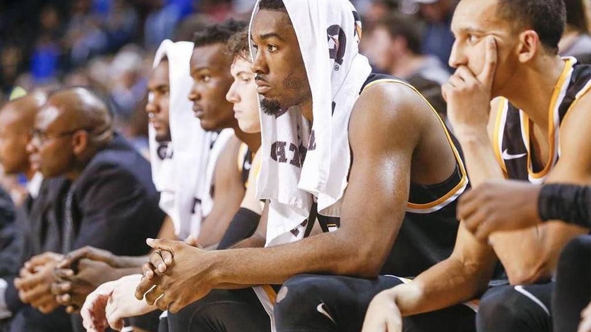 The Shockers watch the final moments of Tuesday’s loss at Tulsa.