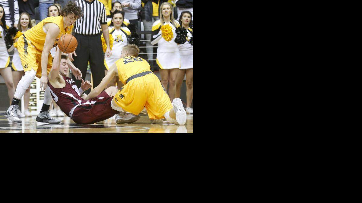 
Wichita State’s Evan Wessel, left, and Rauno Nurger pressure Southern Illinois’ Sean O'Brien into a turnover in the second half at Koch Arena on Wednesday. (Jan. 14, 2014) 
