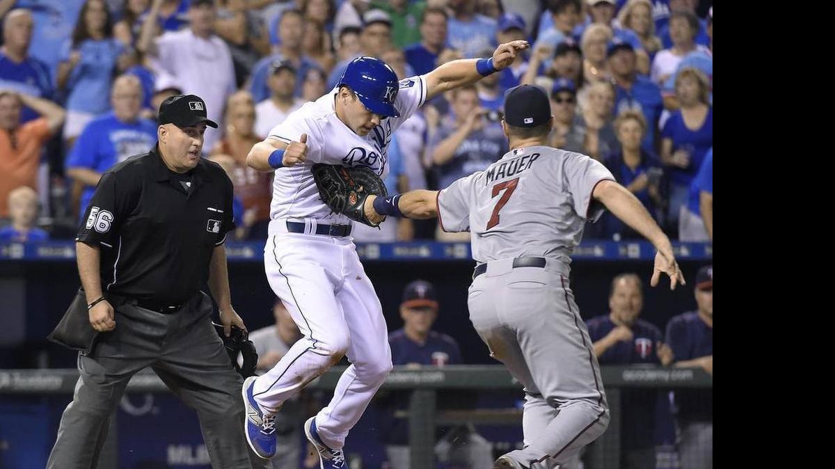 
Dusty Coleman is tagged by Minnesota’s Joe Mauer after a rundown during a game earlier this month at Kauffman Stadium

