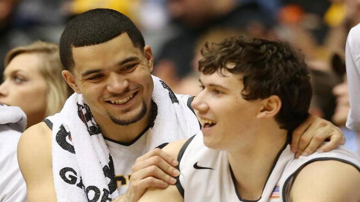 Wichita State’s Fred VanVleet and Evan Wessel joke during the final minutes of Sunday’s game.