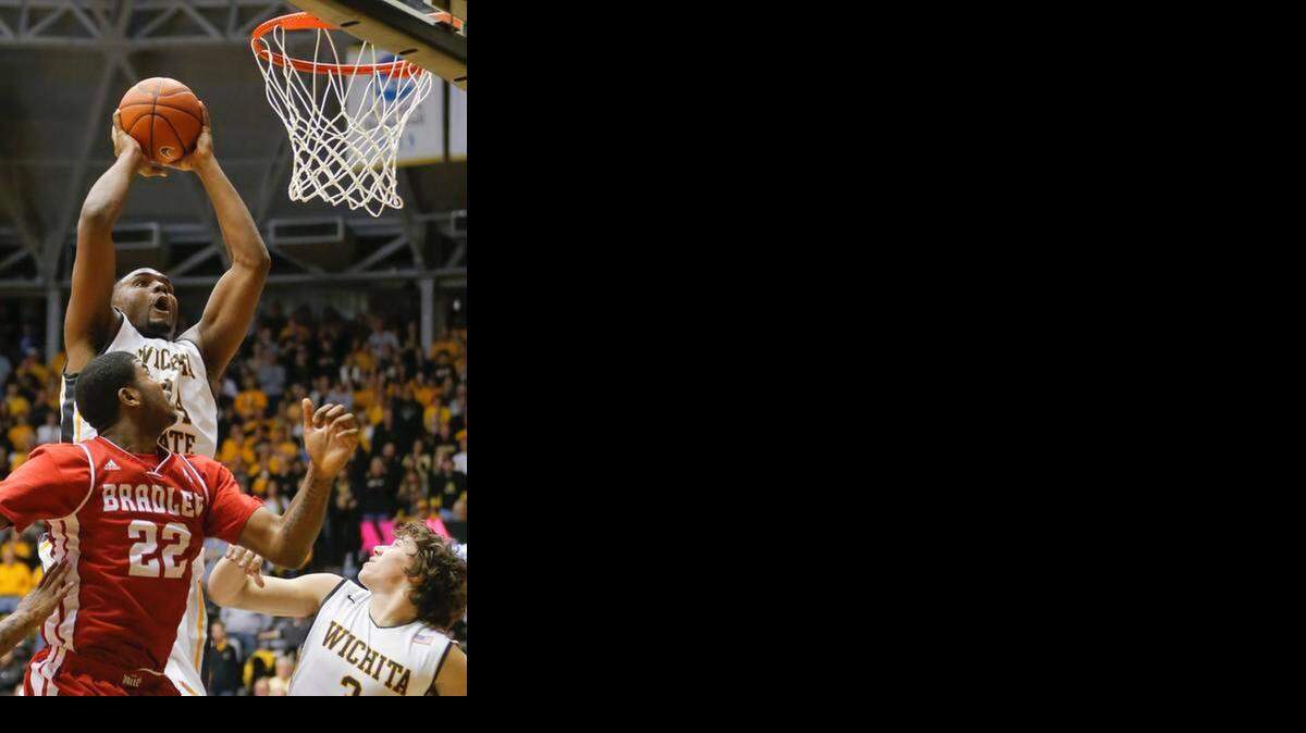 
Wichita State freshman Shaq Morris rebounds against Bradley on Wednesday at Koch Arena.
