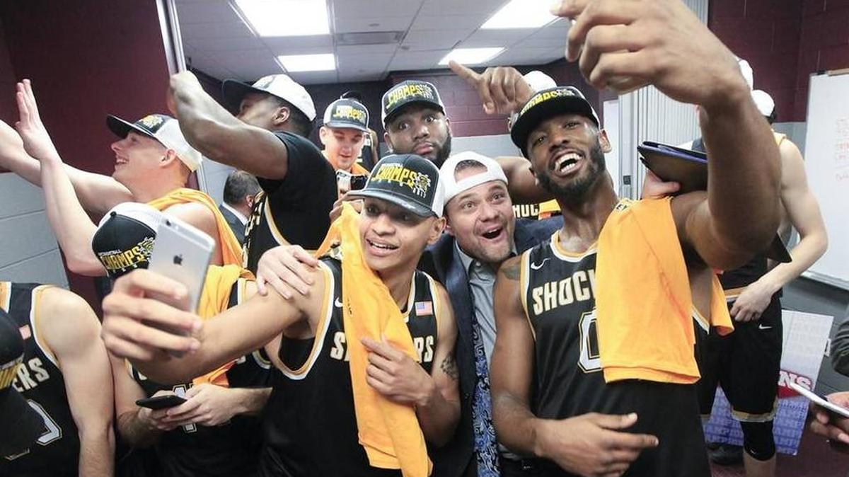 Wichita State players and coaches celebrate after Saturday’s win at Missouri State.