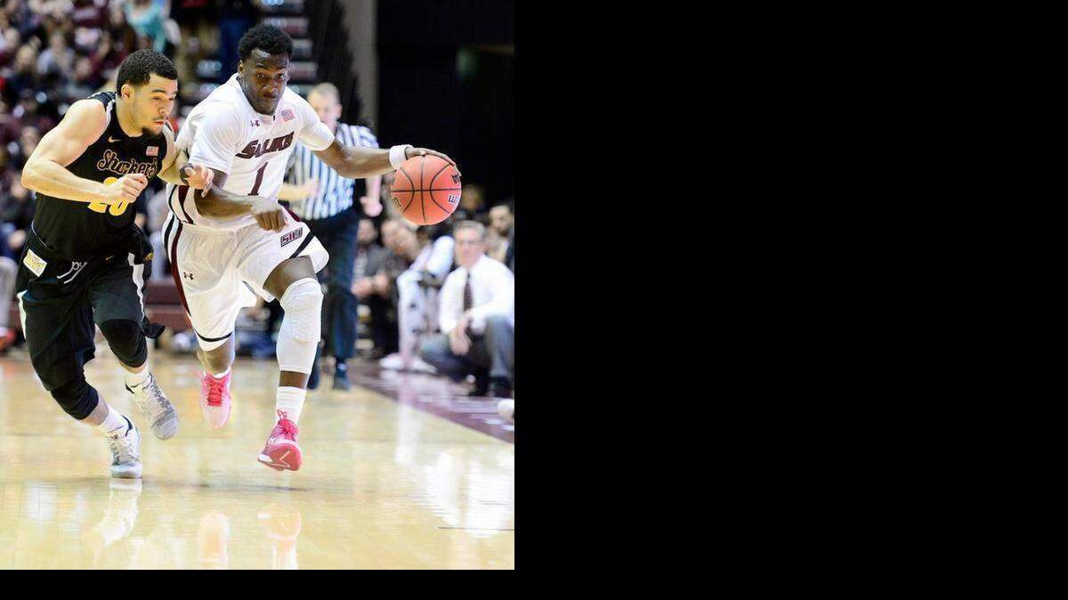 
Wichita State’s Fred VanVleet, left, guards SIU’s Jalen Pendleton during Tuesday’s game at SIU Arena.
