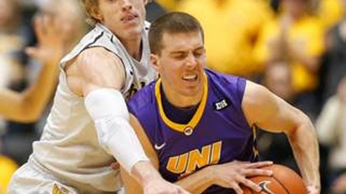 Wichita State’s Ron Baker and Northern Iowa’s Matt Bohannon tussle again at the McLeod Center on Wednesday.