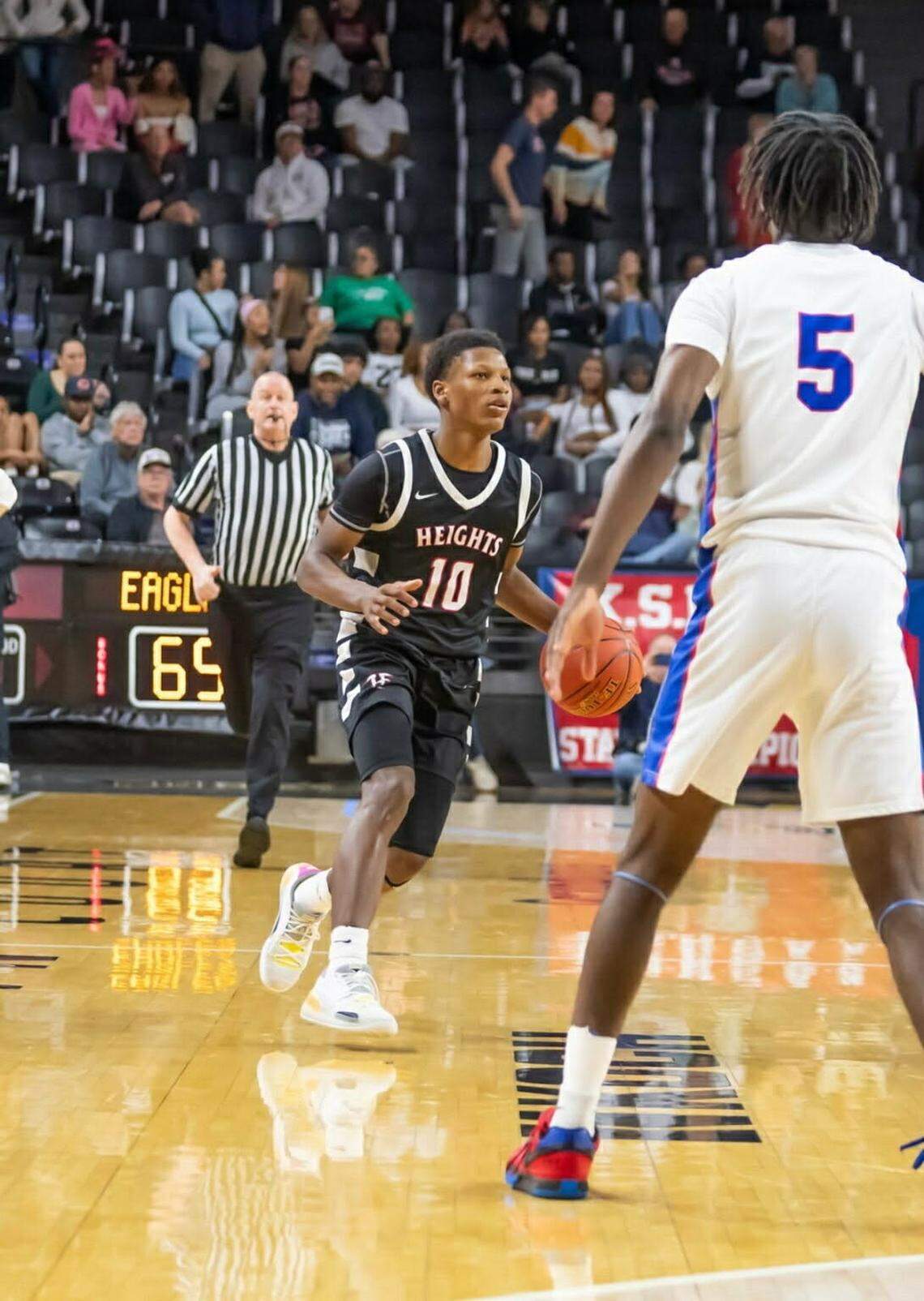 Heights senior Jalihn Timmons erupted for 43 points to tie a program record in last Friday’s win over Andover Central.