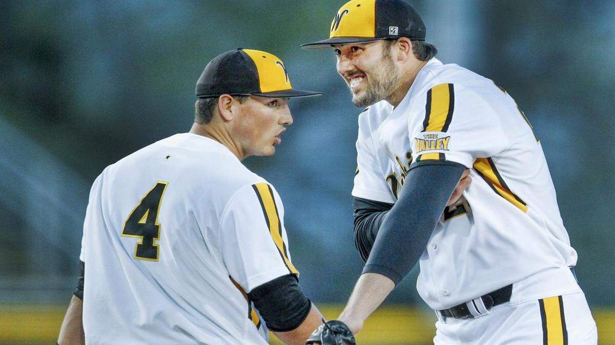 
Wichita State pitcher John Hayes, right.
