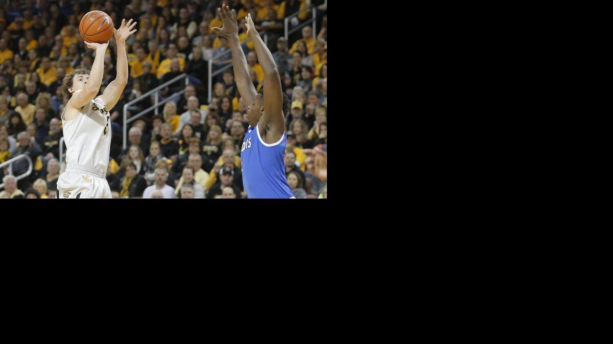 
Wichita State's Evan Wessel makes a three-pointer against Saint Louis during the first half Saturday at Intrust Bank Arena. Wessel scored a career-high 15 points in the Shocker win. 

