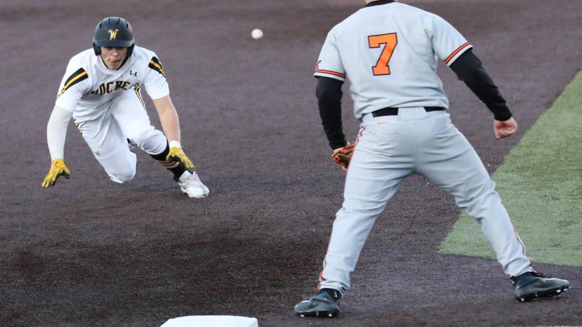 Wichita State’s Alec Bohm slides into third base during last week’s game against Oklahoma State.