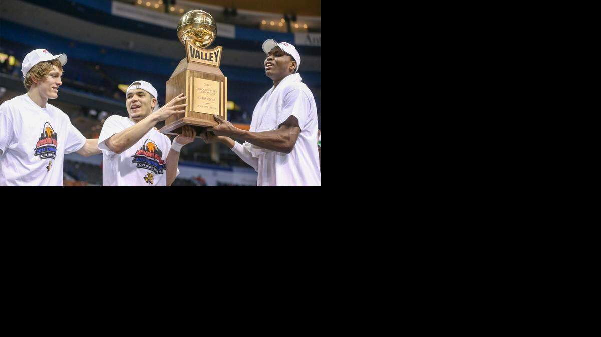 
Wichita State's Ron Baker, Fred VanVleet and Cleanthony Early hold up the 2014 MVC trophy after beating Indiana State in St. Louis last March. The Shockers had few challenges in the Valley last season. The league appears to be stronger at the top this season.
