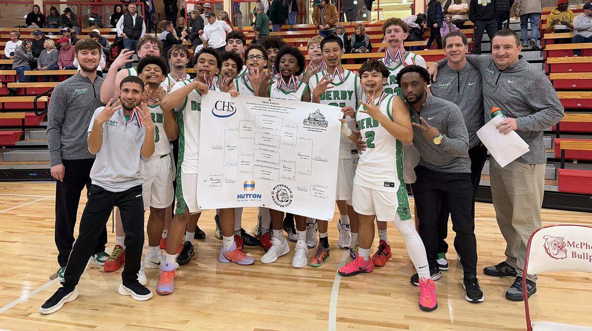 The Derby boys basketball team erased a late deficit to rally for an overtime win over Bishop Carroll in the championship game of the McPherson Invitational Tournament on Saturday.