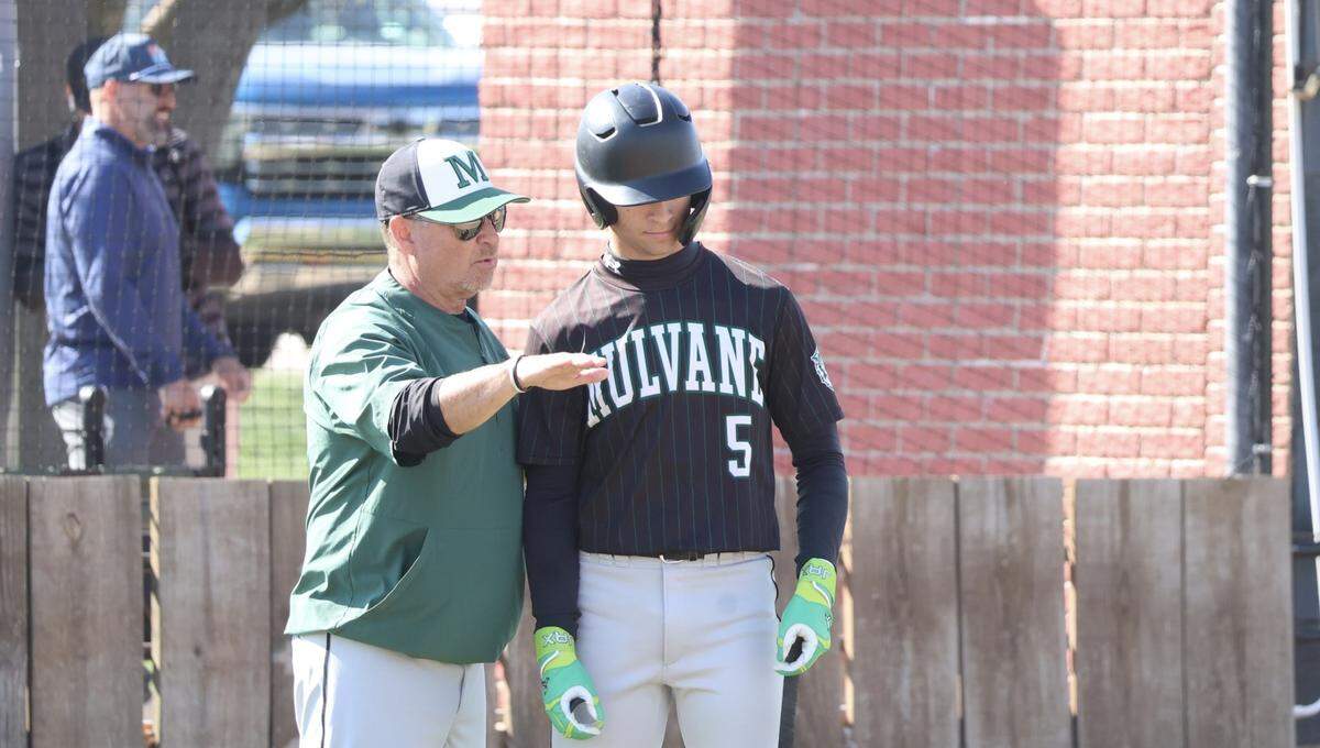 Mulvane baseball coach Steve Nelson talks with junior Grady Myers during a game earlier this season. Nelson, a former Mulvane player who served as a bat boy for the Wildcats’ 1986 state championship team, has helped guide Mulvane back to the state title game for the first time in 40 years.