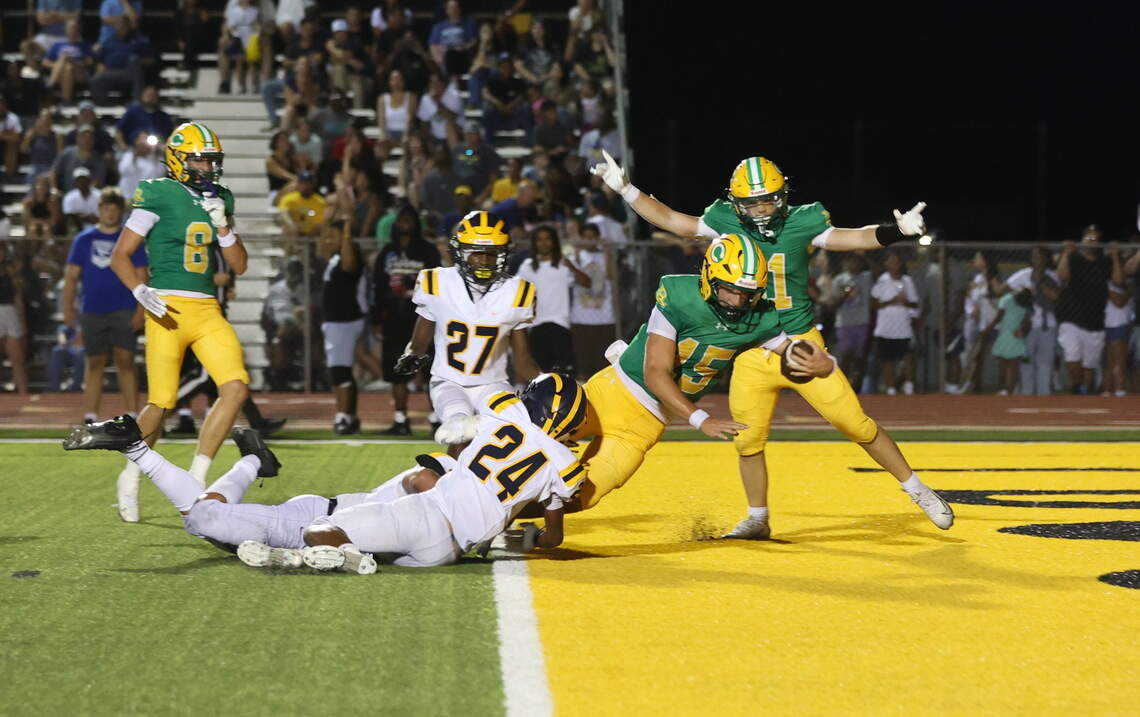 Wichita Northwest and Bishop Carroll players lining up on the line of scrimmage in Kansas high school football rankings matchup