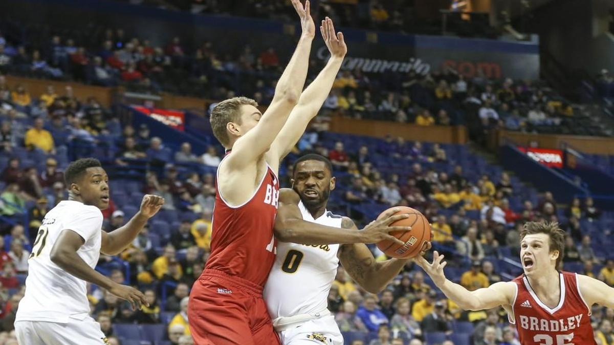 Wichita State forward Rashard Kelly drives to the basket against Bradley forward Luuk van Bree during the first half.