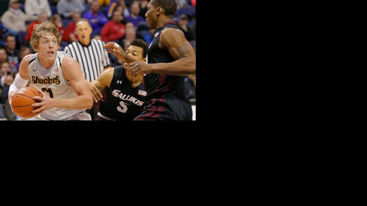 
Wichita State guard Ron Baker tries to get to the basket against Southern Illinois guard Deion Lavender on March 6.
