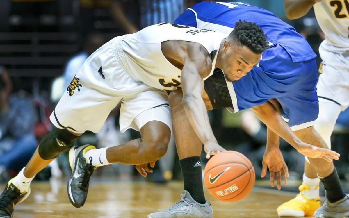 Wichita State’s Markis McDuffie steals the ball from Drake’s T.J. Thomas during the second half Wednesday at Koch Arena.