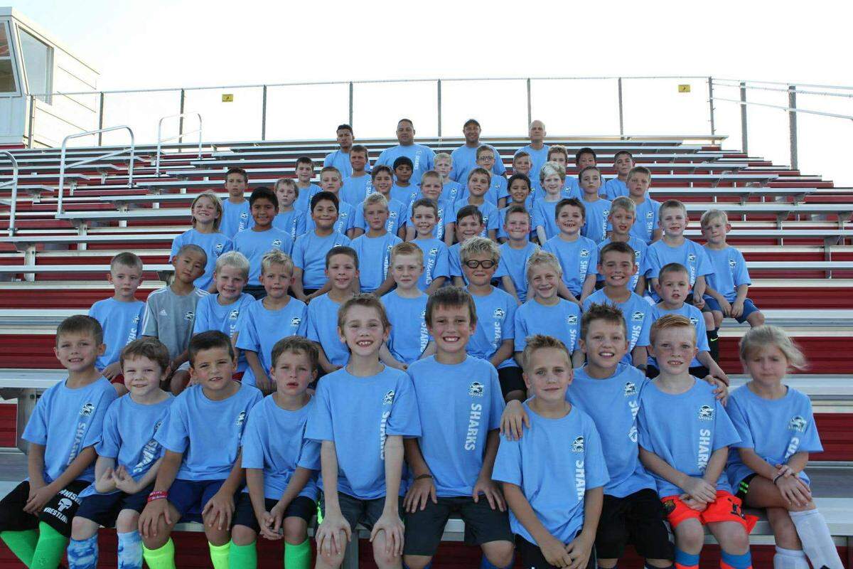 More than a dozen current Rose Hill boys soccer players that just won the Class 4-1A state championship are pictured here when they played for the Sharks club team coached by Jerry Treat and Shelby Kaba.
