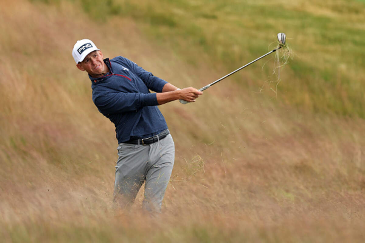 Wichita golfer Sam Stevens, a 2014 Kapaun Mt. Carmel graduate, plays a shot on the 13th hole during the first round of the 126th U.S. Open at Shinnecock Hills Golf Club on Thursday.