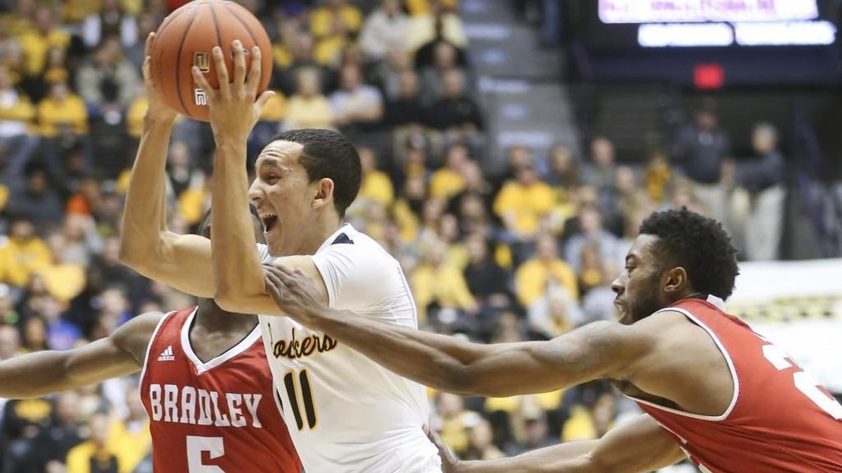 Wichita State guard Landry Shamet is fouled by Bradley guard JoJo McGlaston during the first half of their game at Koch Arena on Sunday.