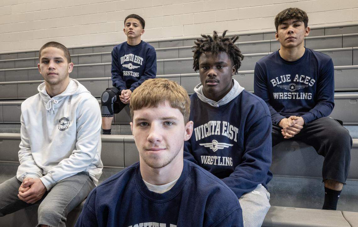 After experiencing a tragedy right before the season, the Wichita East boys wrestling team is like a close-knit family now. From left to right: Jordan Noble, Enrique Tellez Jr., Anthony Noble, Donnie Jackson and Sebastian Trujillo.