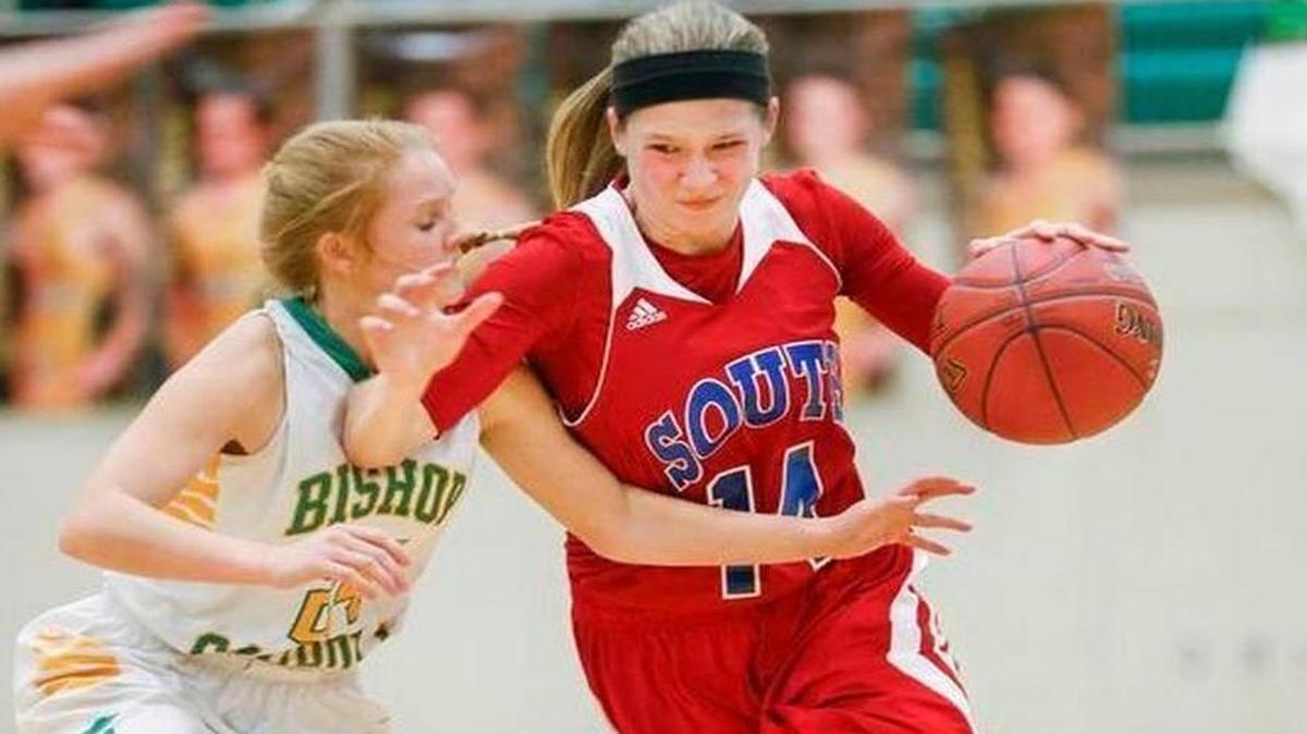 
South point guard Ericka Mattingly drives the ball against Bishop Carroll last season. Mattingly, an All-State selection and senior at South, decommitted from Wichita State on Monday. 

