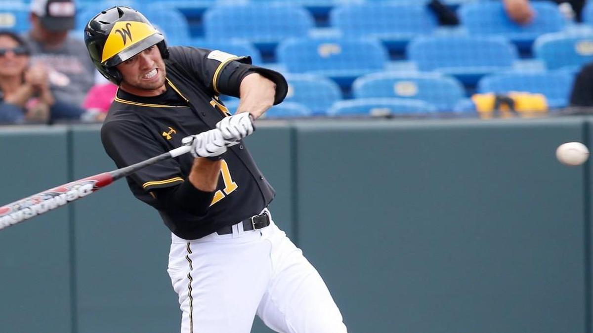 
Ryan Tinkham hits against Illinois State this spring. He hit .333 and led the Shockers with 19 doubles and 10 home runs, then spent the summer bulking up. 
