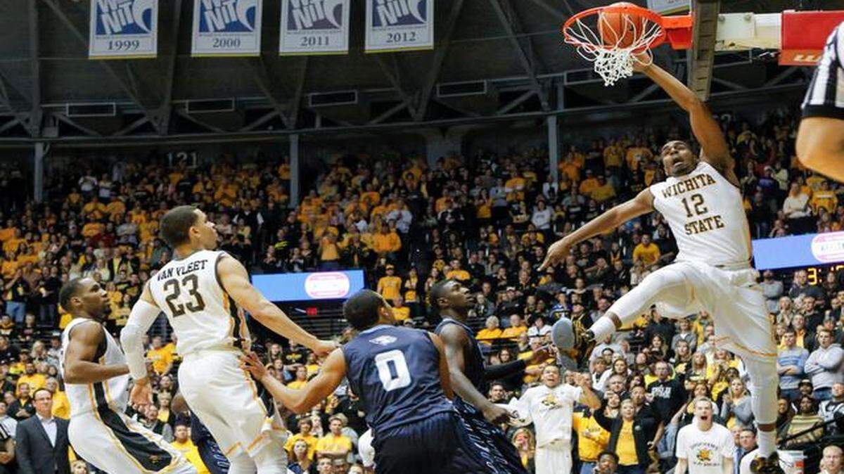 
Wichita State's Darius Carter throws down a dunk against Northwood during the second half of Saturday's exhibition game at Koch Arena.

