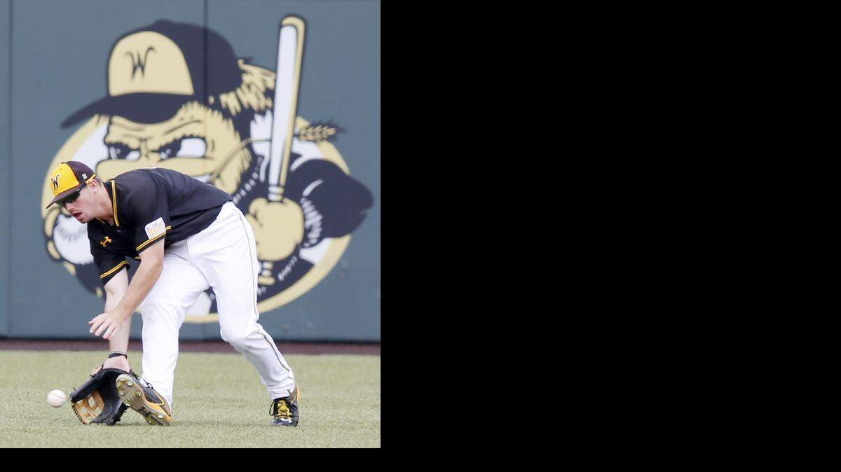 
Wichita State University's outfielder Daniel Kihle fields a grounder during the third inning against Illinois State.
