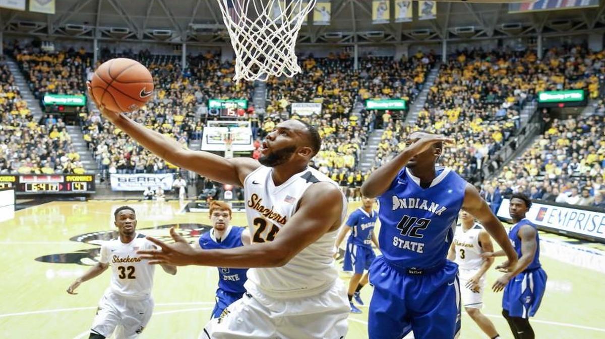Wichita State center Shaquille Morris goes to the basket against Indiana State center T.J. Bell on Saturday at Koch Arena.