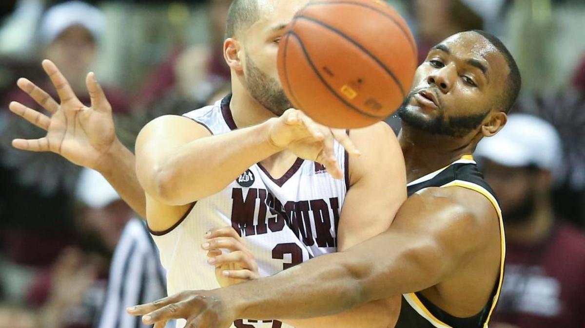 Wichita State forward Shaq Morris defends Missouri State forward Camyn Boone last week.