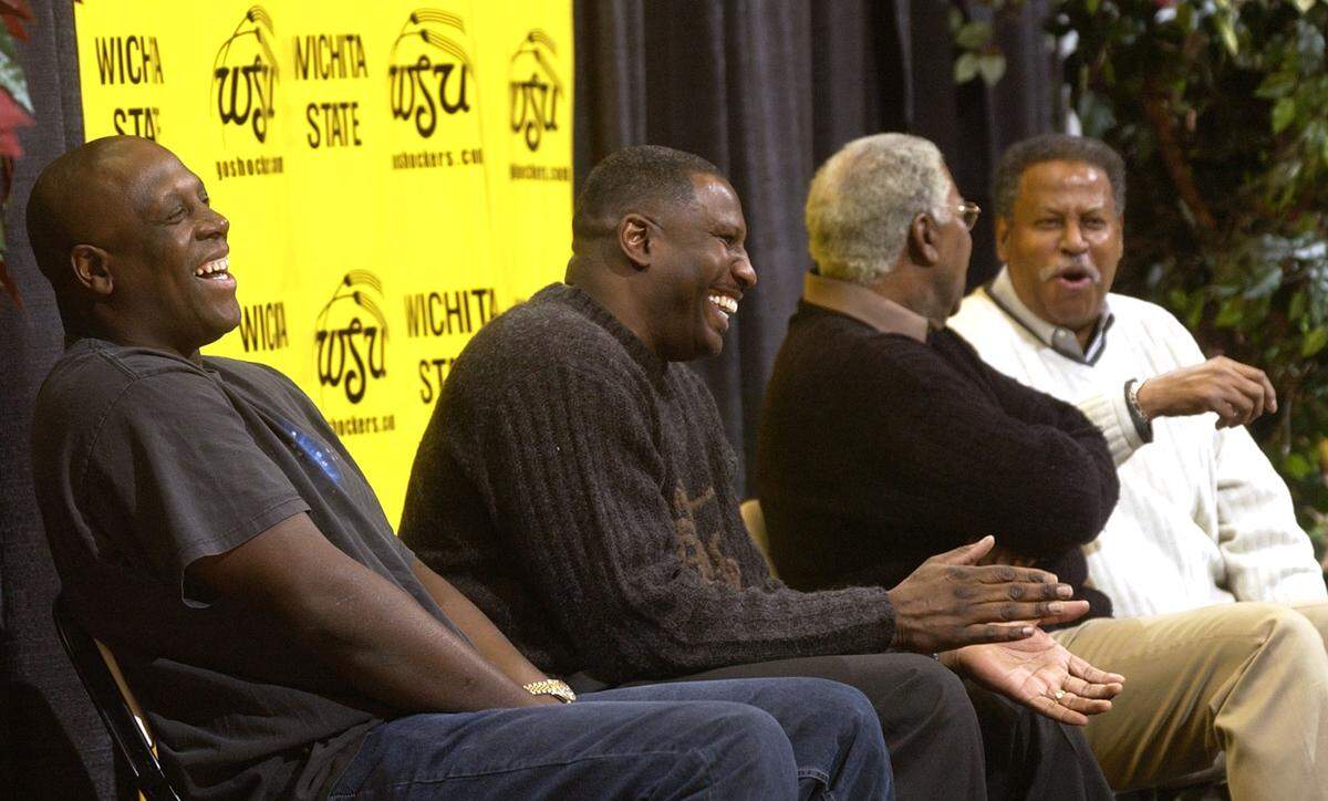 Wichita State legends Xavier McDaniel, Cliff Levingston, Dave Stallworth and Cleo Littleton share a laugh during a 2003 WSU event. Littleton remained revered by the Shocker greats who followed him for both his record-setting career and trailblazing legacy.