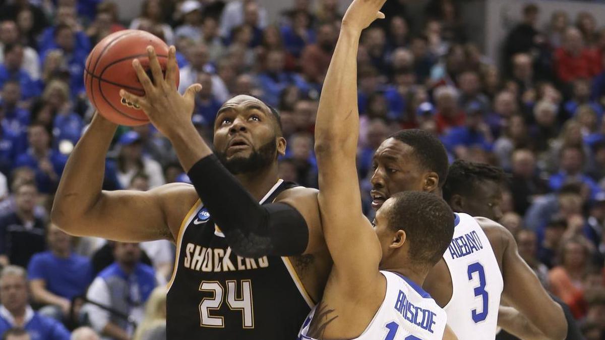 WSU center Shaquille Morris goes to the basket against Kentucky in the NCAA Tournament. WSU and Kentucky are in the same bracket released Thursday by ESPN’s Joe Lunardi.