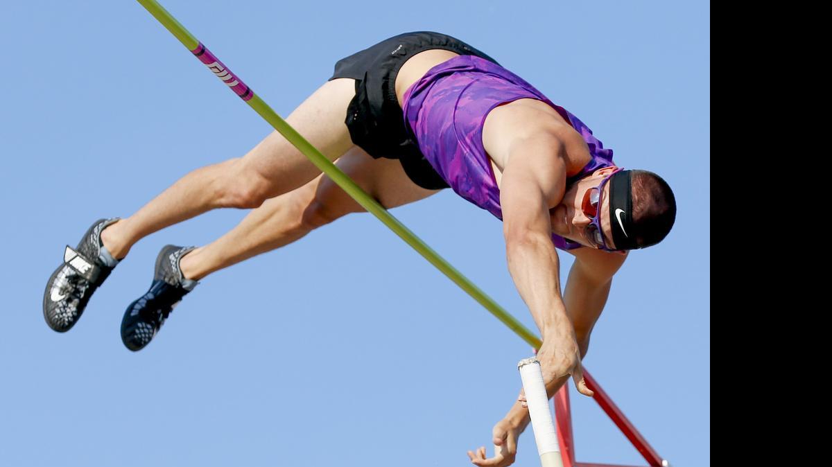 
Professional pole vaulter Jack Whitt clears the bar at 18 feet, 7 inches to win the event at Saturday’s River Festival.
