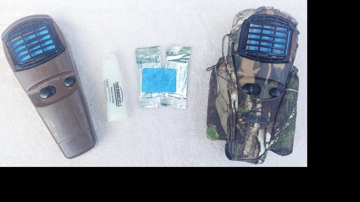 
The Thermacell unit, left, is about 99.9-percent effective at repelling mosquitoes.It is powered by a butane cylinder which heats a blue pad treated with repellant. The holster, sold separately, comes with a clip.
