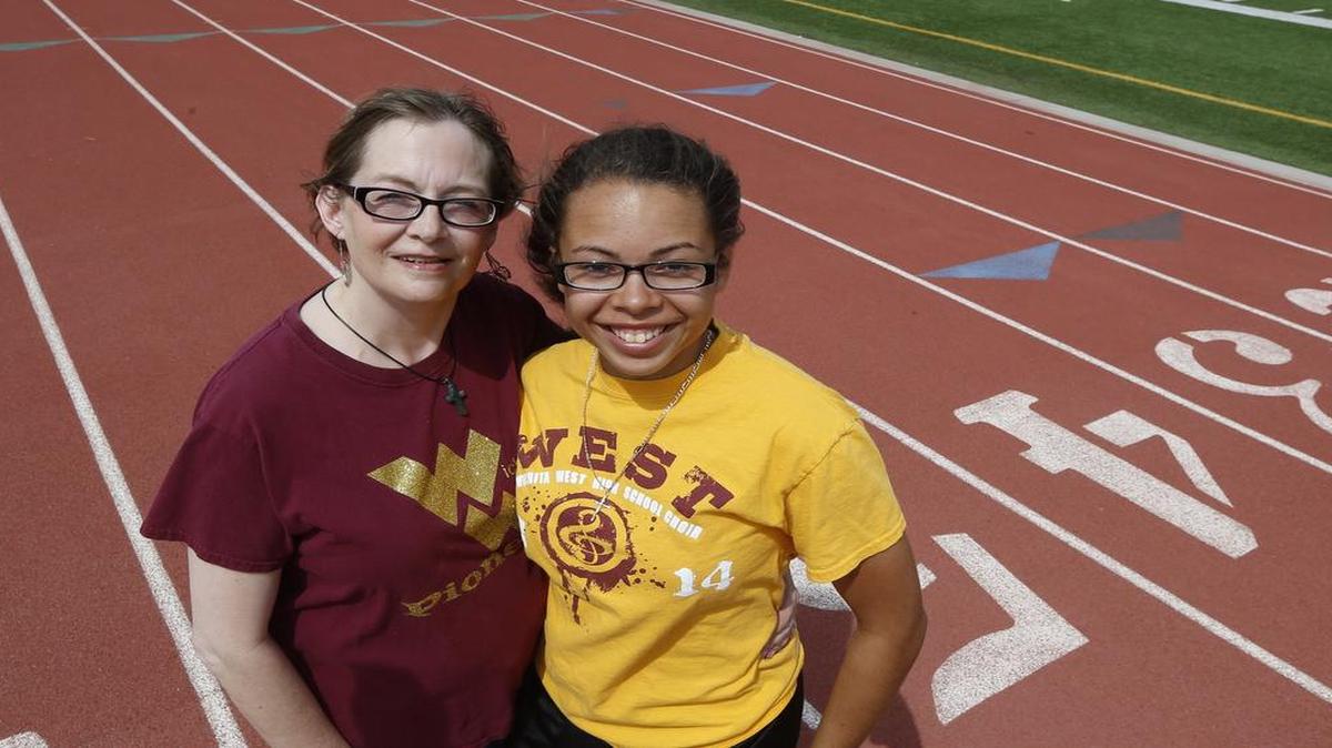 
Angelia Murray and her mom, Jodi on the track at West High.
