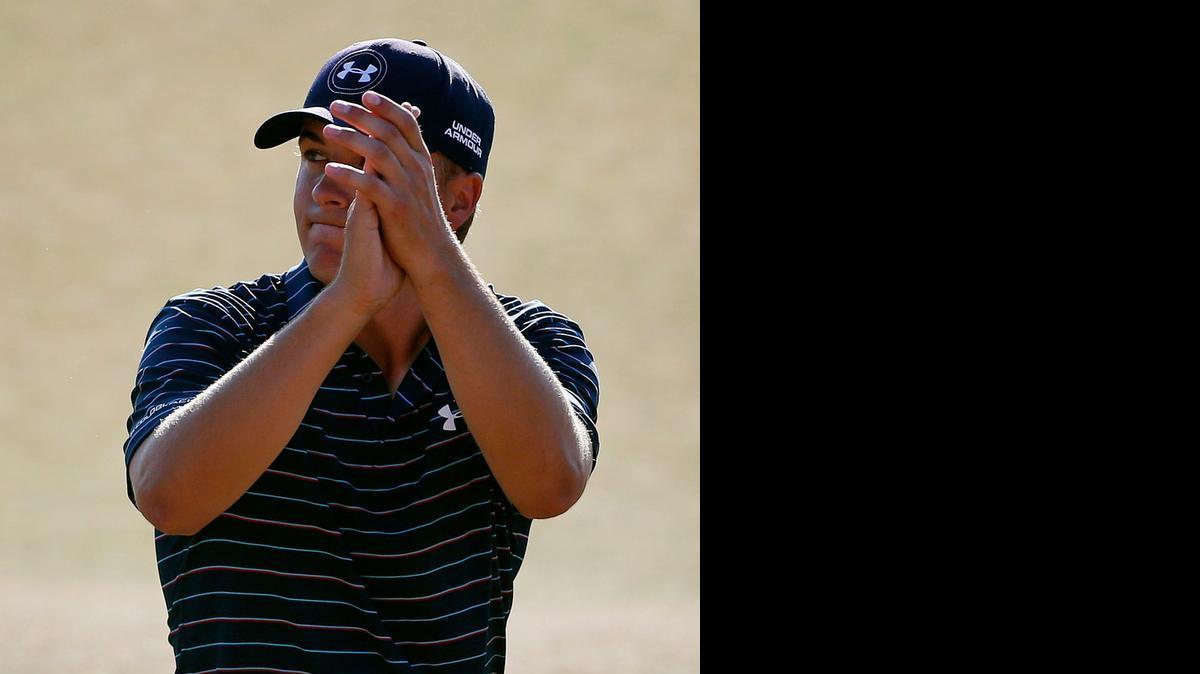
Jordan Spieth claps after finishing final round of the U.S. Open at Chambers Bay on Sunday in University Place, Wash. Spieth won the championship. 
